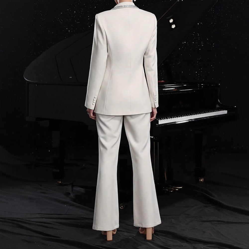 Elegant women's hollow-out long-sleeve suit jacket and pants set by Plush Fashion Hub, stylish and sophisticated clothing ensemble.