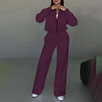 Women’s casual zip-up sweatsuit set from Plush Fashion Hub featuring a hoodie-style jacket and wide-leg sweatpants.
