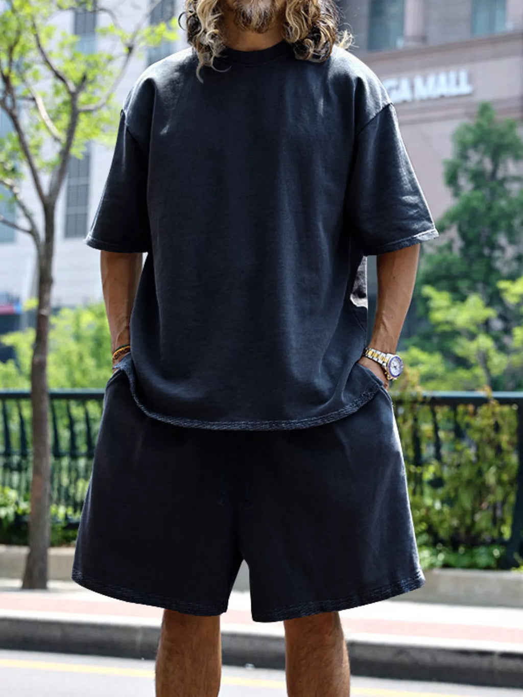 Men's relaxed fit T-shirt and shorts set by Trendsi, plus size casual tops and shorts for comfortable everyday wear.