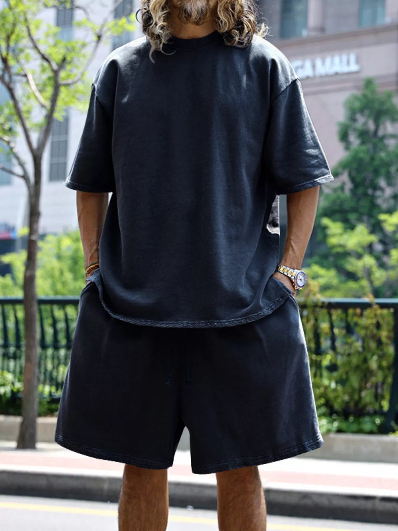Men's relaxed fit T-shirt and shorts set by Trendsi, plus size casual tops and shorts for comfortable everyday wear.