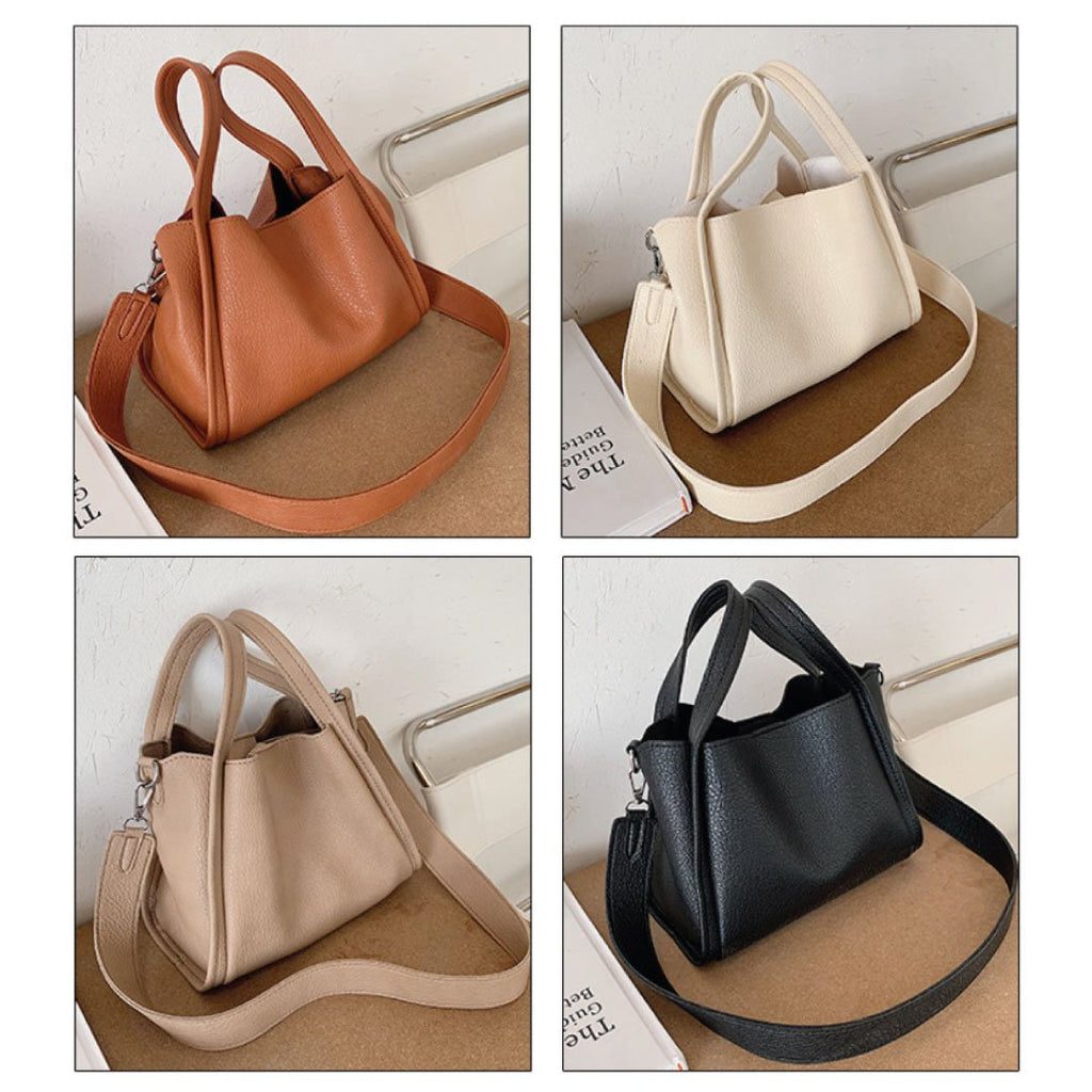 LadyShow.Store Kira handbag with stylish design, showcasing the elegant exterior and top handle of the women's handbag.
