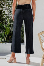 High-waisted button-fly wide-leg jeans from Trendsi, shown in a front view with classic denim wash and relaxed fit.