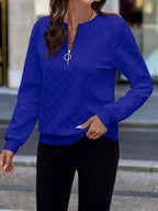 Textured quarter-zip sweatshirt from Trendsi, showcasing a close-up of the soft fabric and stylish design.