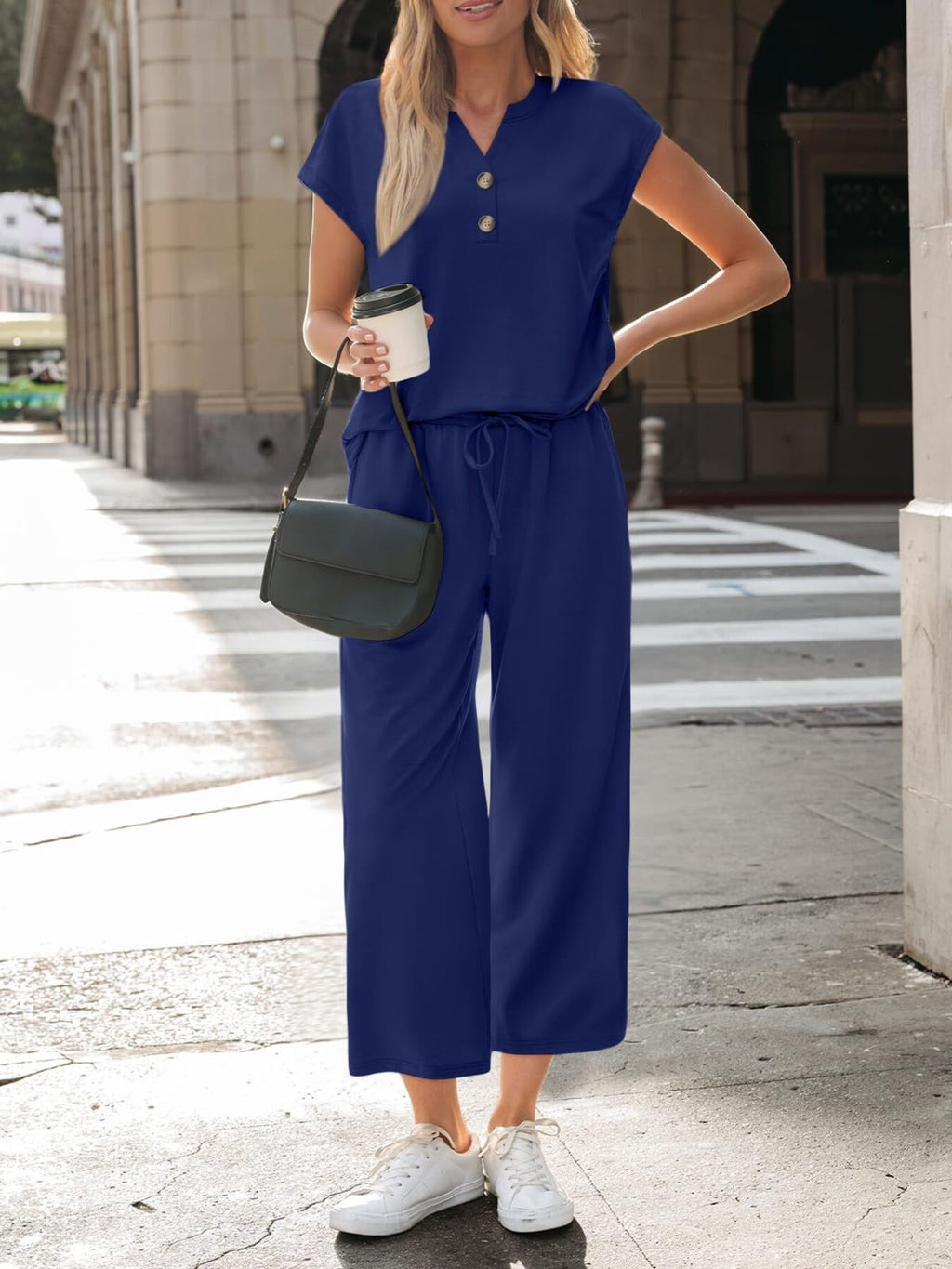 Women's notched short sleeve lounge set with pockets, 2-piece sleepwear from Trendsi, featuring comfortable fabric and relaxed fit.