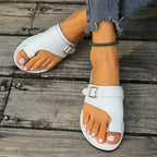 Women's PU leather toe loop sandals with buckle accent from Plush Fashion Hub, showcasing comfortable design and stylish details.