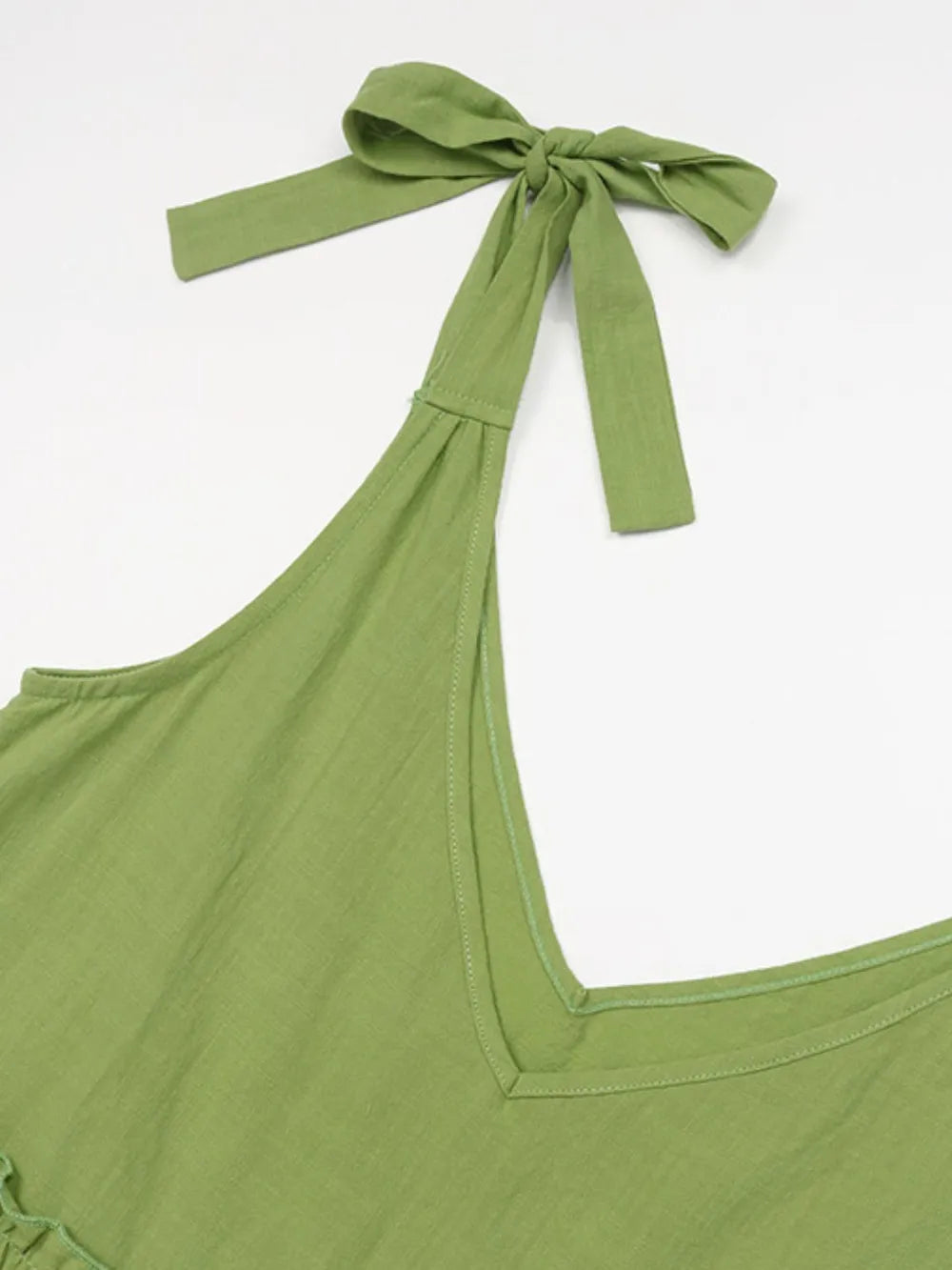 Women's cotton tiered frill V-neck sleeveless summer dress by Trendsi, featuring a flowy, lightweight design with ruffle details.