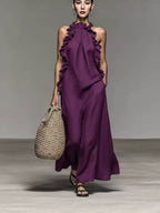Plush Fashion Hub halter neck ruffled sleeveless casual dress with pockets, loose fit and flowy design, perfect for relaxed wear.