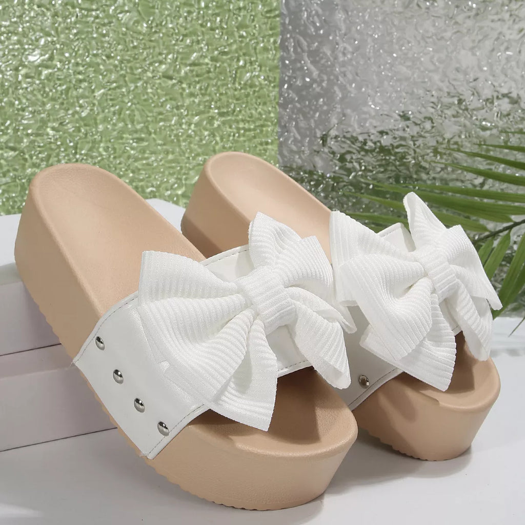 Women's chic bow decor platform sandals by Trendsi, featuring comfortable flat walking shoes with stylish bow accents and open-toe design.