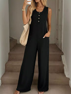 Plush Fashion Hub sleeveless button-front wide-leg jumpsuit with pockets, casual chic romper in lightweight fabric.