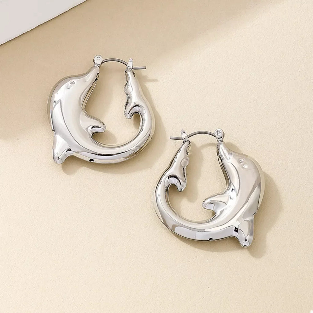 18K gold-plated dolphin hoop earrings with detailed fin and tail design, lightweight jewelry for daily wear