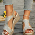 Open toe wedge sandals by Shopimist featuring a stylish design with a comfortable platform and ankle strap.