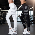 Women’s printed activewear workout leggings by FitiqueFit, slim fit pencil pants with colorful geometric patterns.