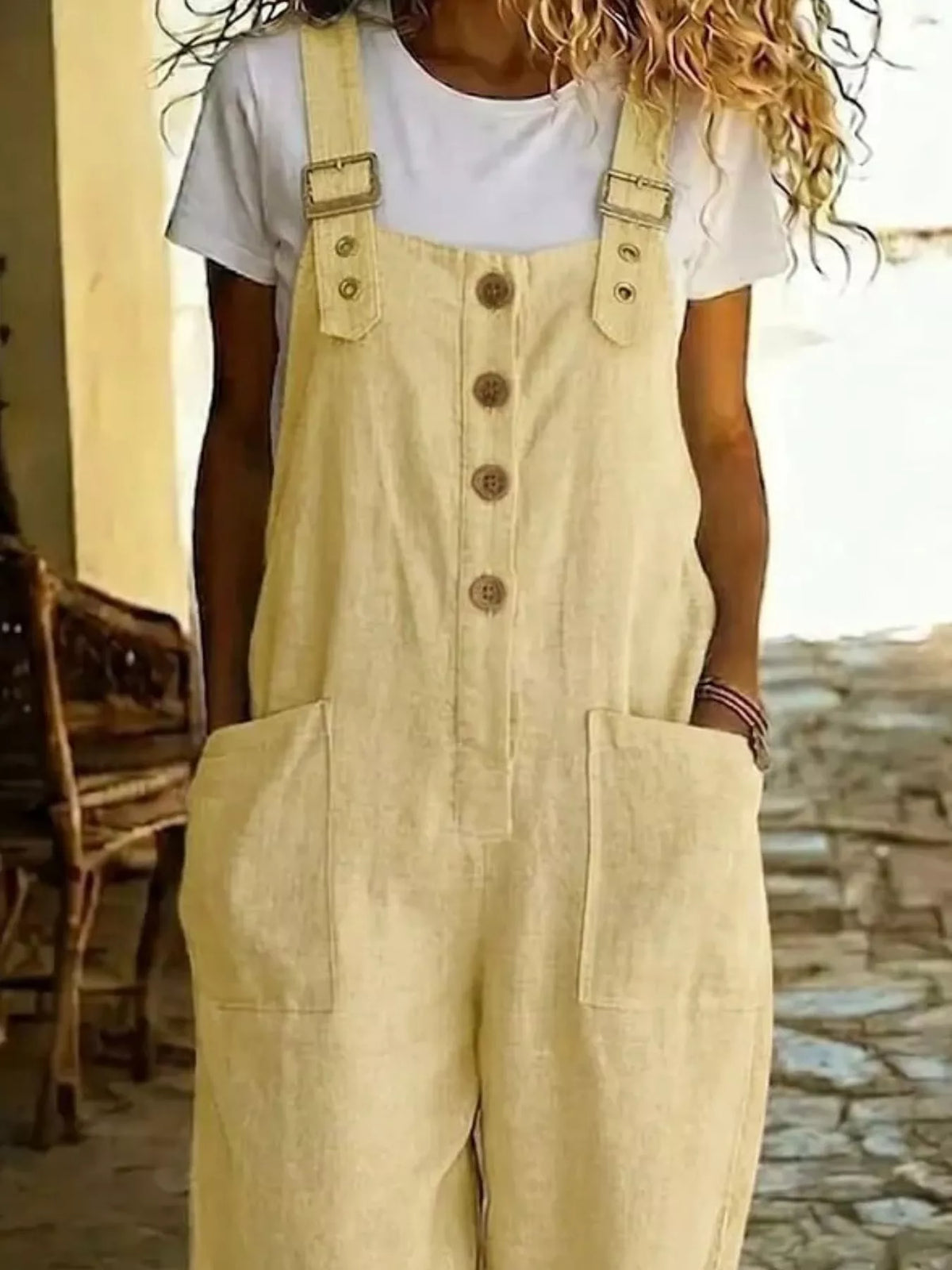Casual button-front wide-leg overalls by Plush Fashion Hub, featuring a relaxed fit and adjustable straps in soft denim fabric.