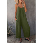 Women's pleated chest cross-strap jumpsuit by Plush Fashion Hub, featuring a stylish design and tailored fit.