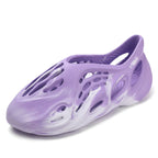 Trendsi hollow-out flat sandals featuring open-toe design, adjustable ankle strap, and minimalist style for casual wear.