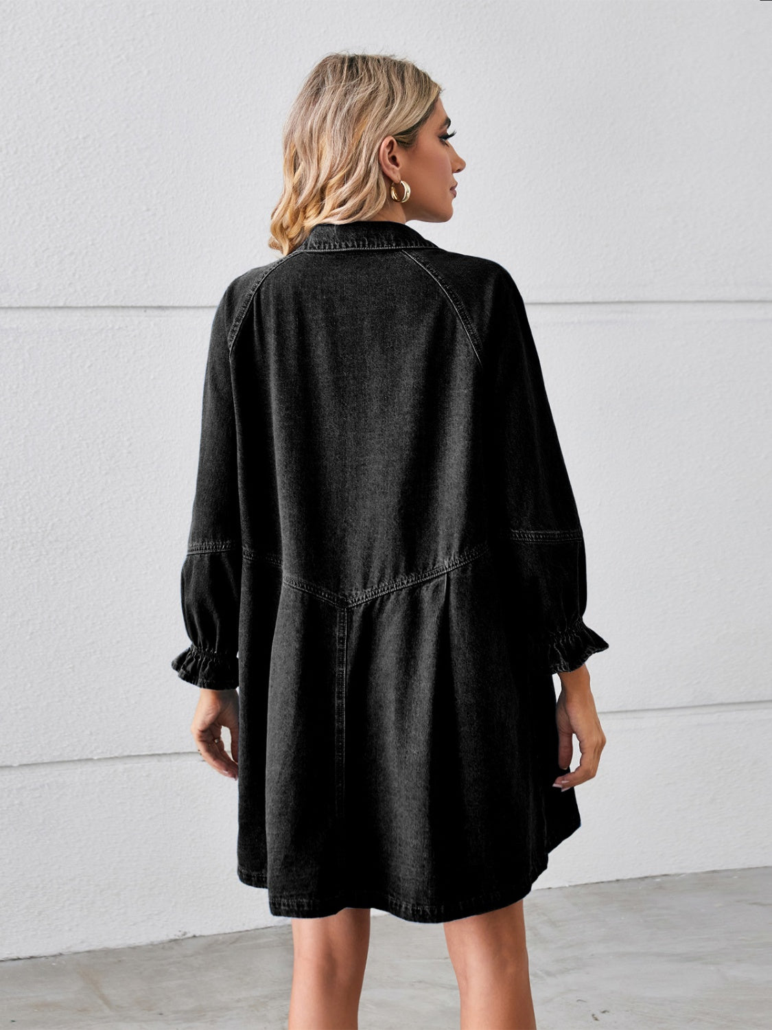 Button-up mini denim dress with flounce sleeves from Plush Fashion Hub, showing the front view with buttons and stylish sleeve details.