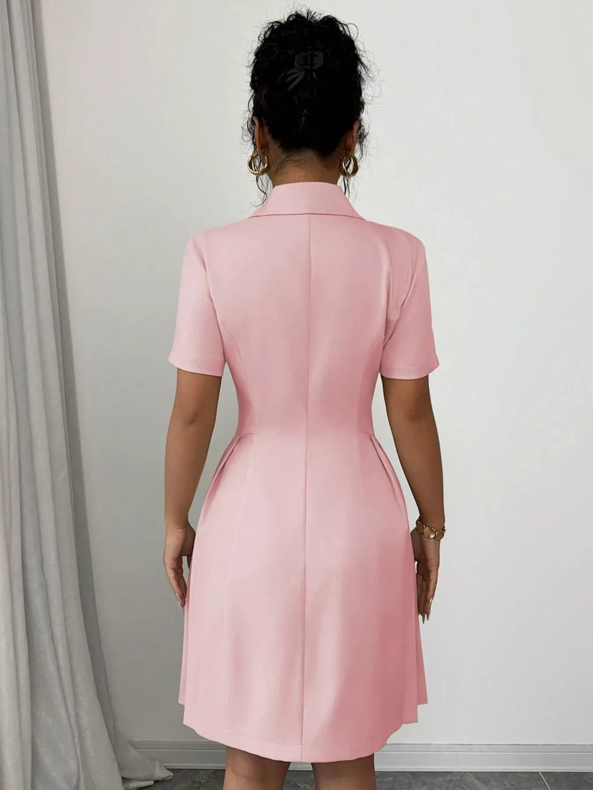 Double-breasted pleated blazer dress in black from Plush Fashion Hub, featuring structured shoulders and a tailored fit.