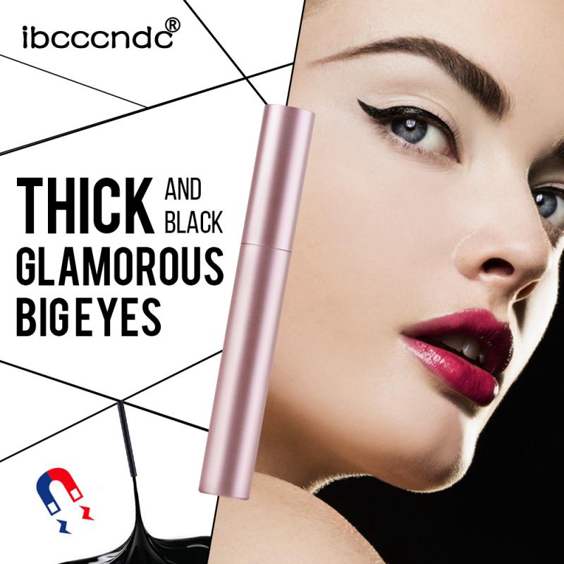 Metallic pink eyeliner tube next to a woman wearing black winged eyeliner and red lipstick.