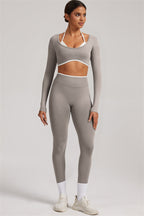 Fitglutes Activewear long sleeve crop top and leggings 2-piece set, athletic gymwear for workout and fitness activities.