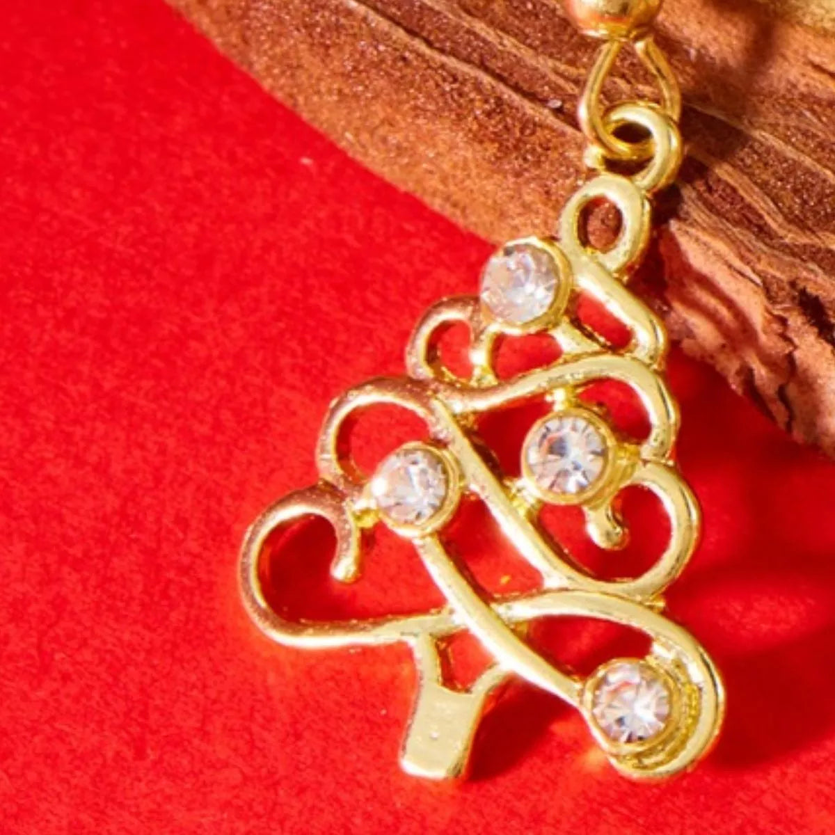 18K gold-plated rhinestone Christmas tree dangle earrings featuring sparkling stones and festive holiday design.