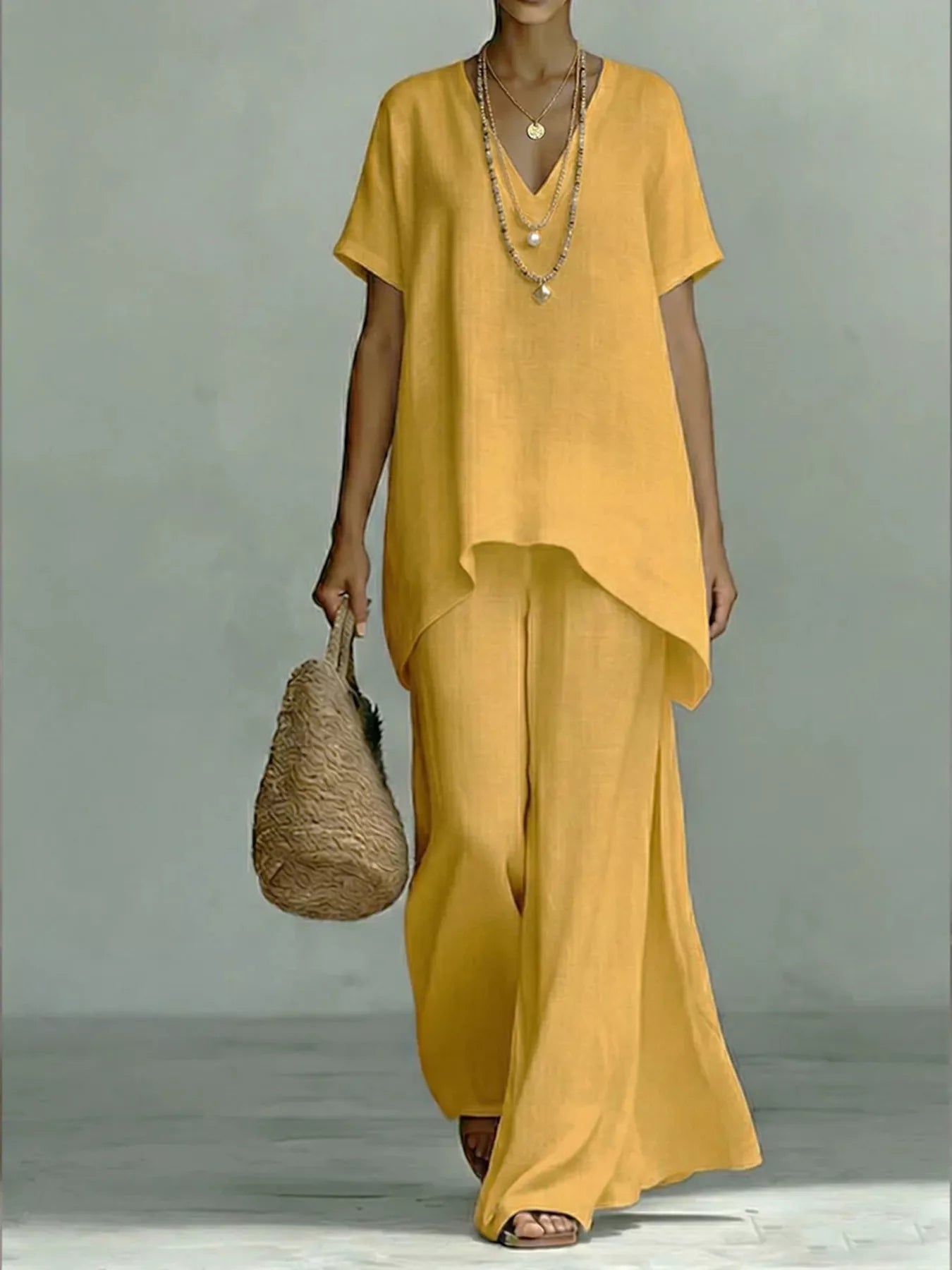 Plus size Shopimist two-piece set with a V-neck top and wide-leg pants, stylish and comfortable for everyday wear.