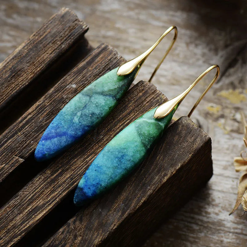 Copper natural stone geometric shape earrings with earthy tones and modern design, featuring organic, angular shapes and polished finish.