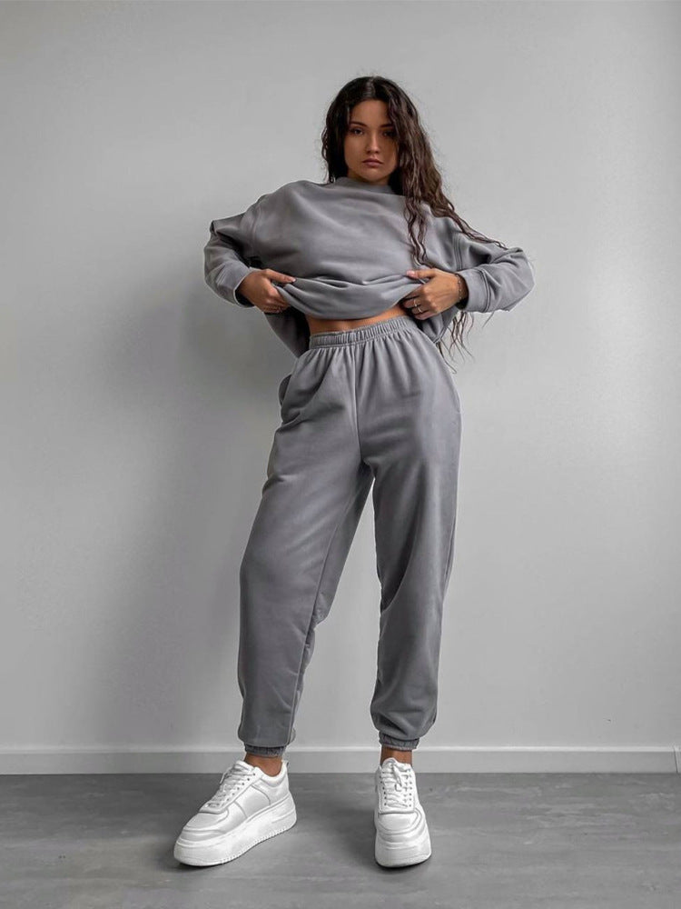 Plush Fashion Hub women's two-piece set with loose-fit crewneck sweatshirt and jogger pants in soft, casual style.