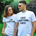 Couples wearing matching FitiqueFit short sleeve casual T-shirts, front view, showcasing comfortable, stylish everyday wear.