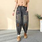 Women's patchwork embroidered cropped harem pants by FitiqueFit, featuring wide leg, high waist, and denim casualwear style.