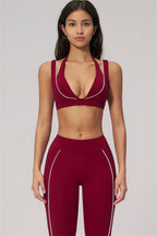 Fitglutes Activewear sports bra and leggings set featuring contour lines, designed for workout and gymwear, in matching black and gray.
