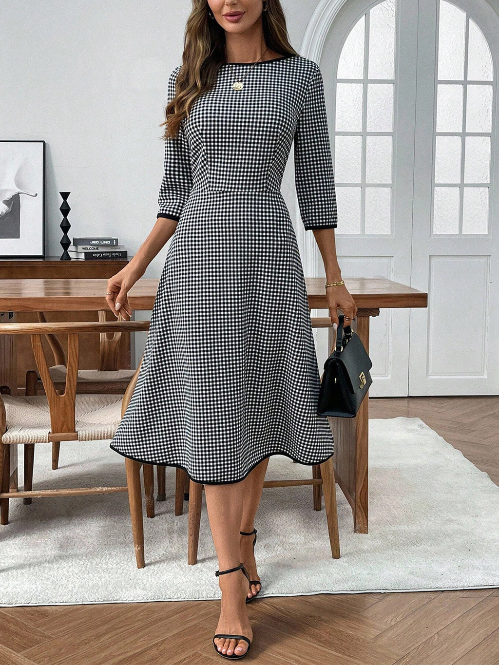 Classic plaid round neck midi dress with 3/4 sleeves from Trendsi, featuring a stylish, comfortable design and midi length.