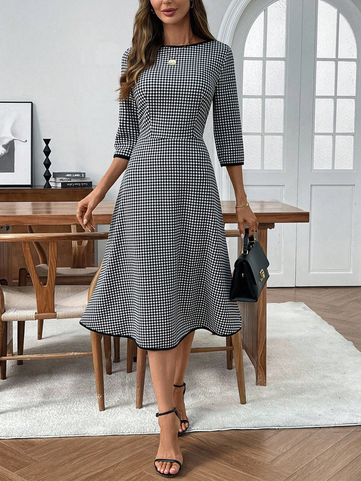Plush Fashion Hub classic plaid round neck midi dress with 3/4 sleeves, featuring a stylish and comfortable design.