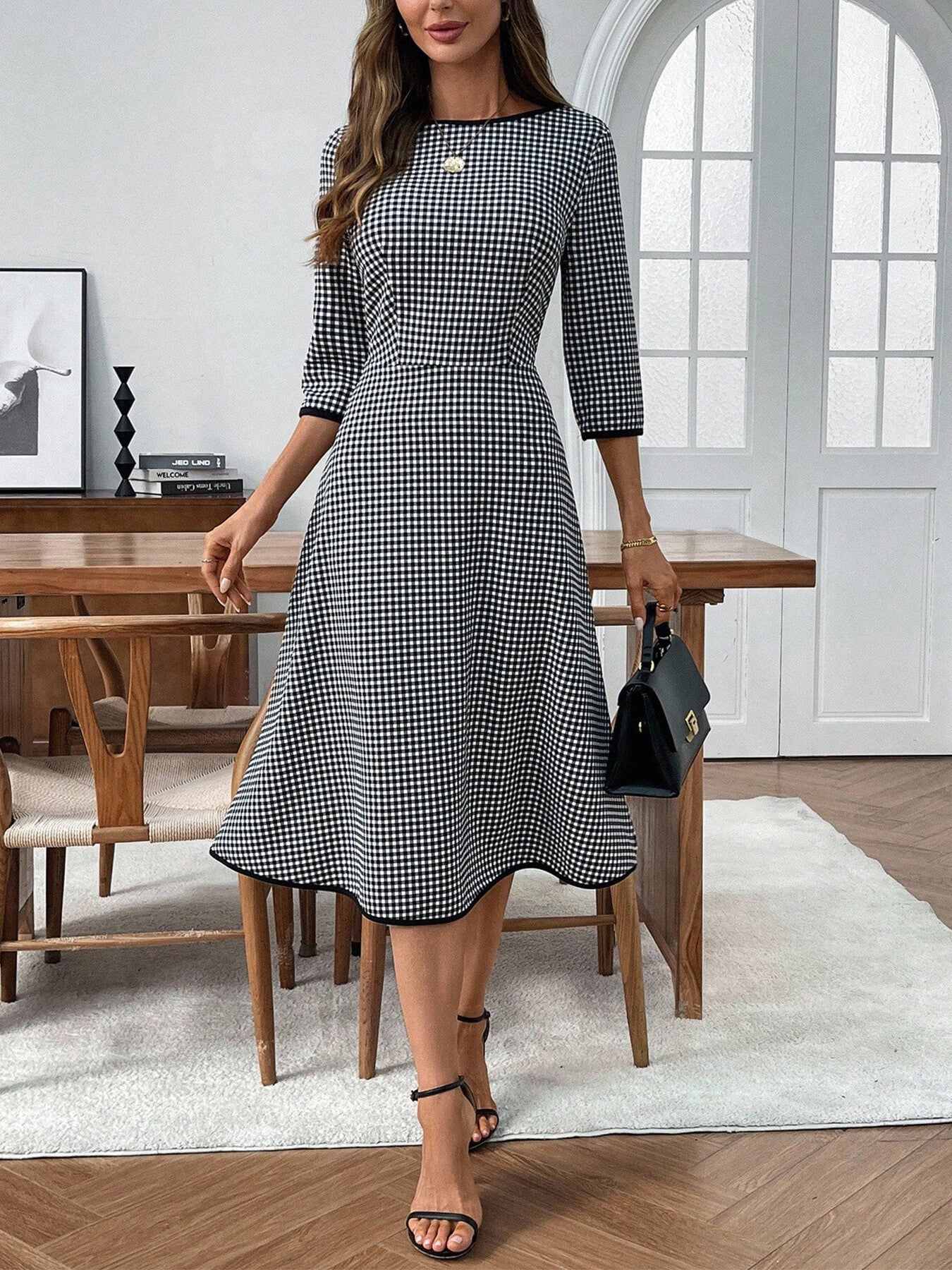 Classic plaid round neck midi dress with 3/4 sleeves from Trendsi, featuring a stylish, comfortable design and midi length.