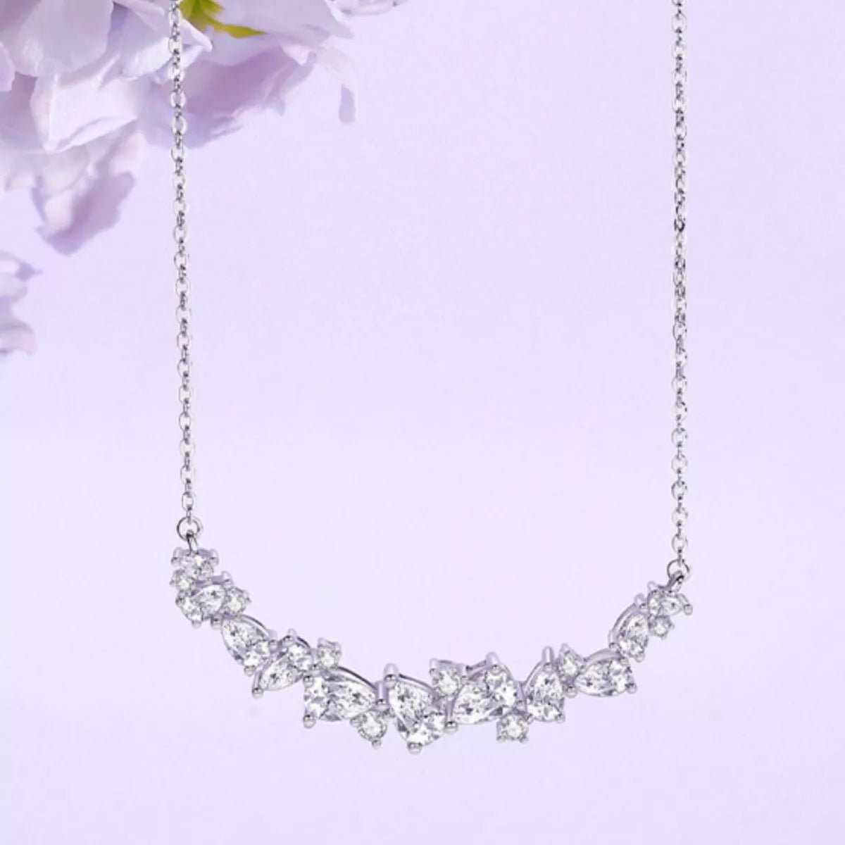 925 sterling silver zircon necklace with a delicate chain and sparkling pendant, showcasing elegant jewelry design.