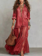 Long sleeve sheer ruffle maxi dress by Shopimist featuring flowing fabric and elegant ruffle details.