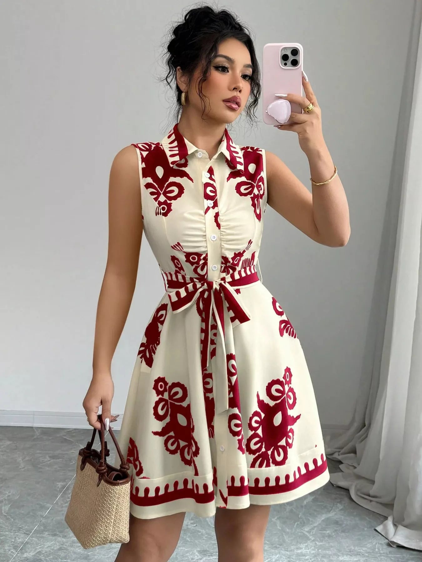 Sleeveless ruched printed tie waist dress from Shopimist, featuring a feminine design with a fitted waist and vibrant pattern.