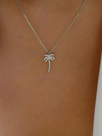 Zircon palm tree pendant necklace with sparkling stones on a delicate chain, stylish jewelry by Shopimist.