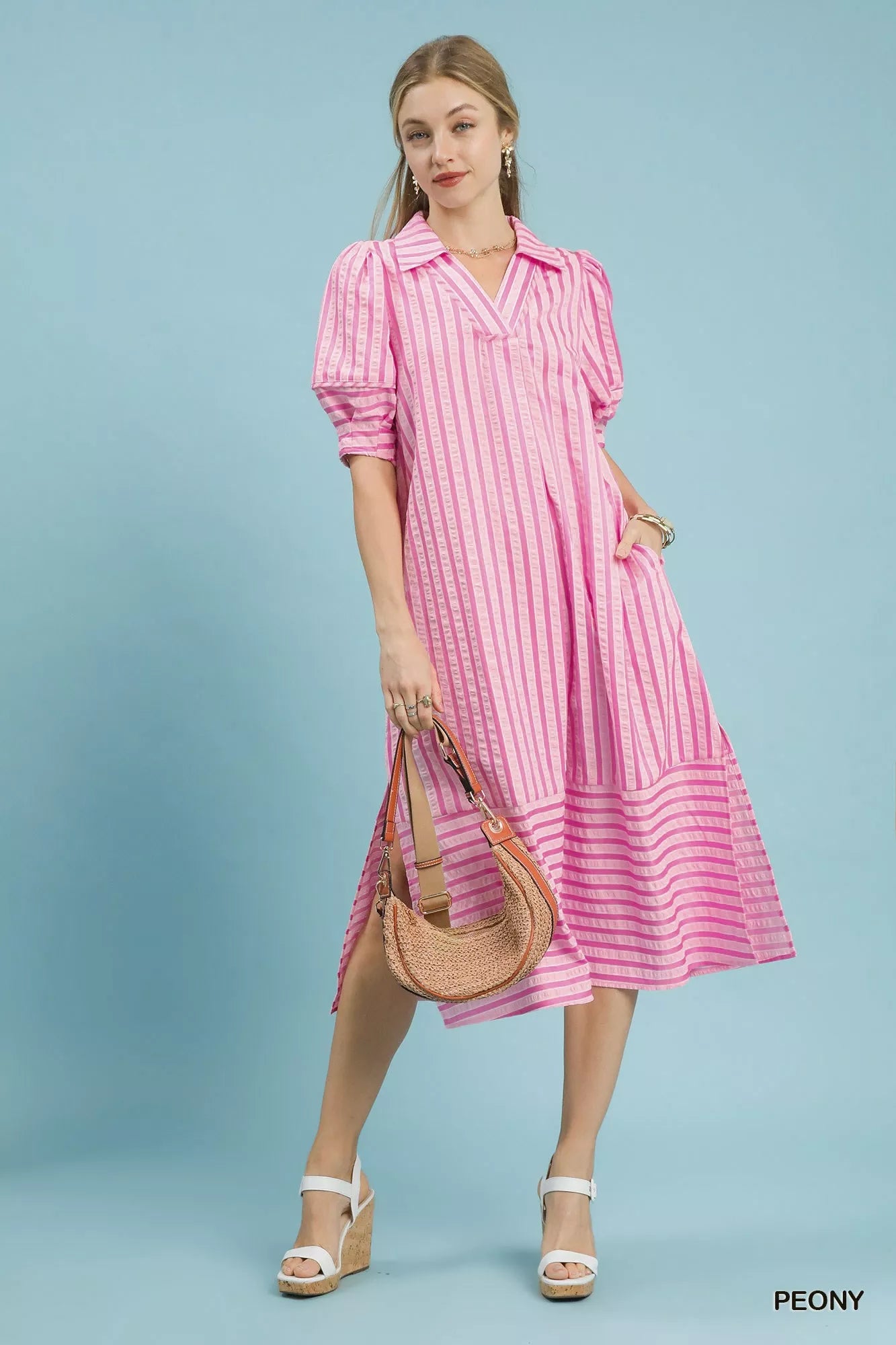 Umgee striped puff sleeve midi dress featuring a flattering fit and stylish design, perfect for casual or semi-formal occasions.