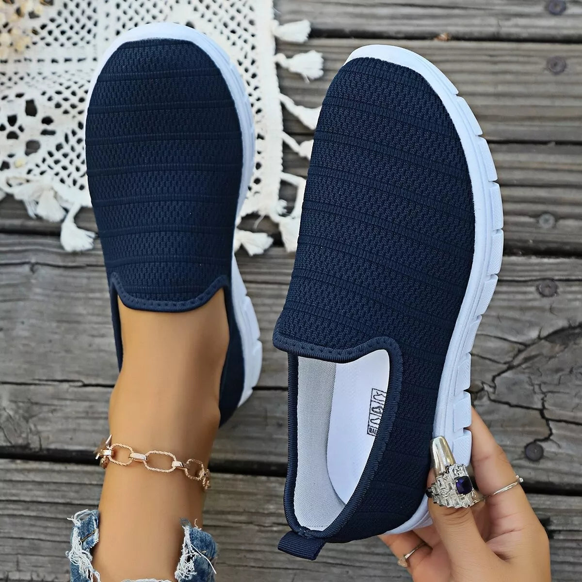 Women's breathable mesh slip-on casual walking flats by Trendsi, lightweight and comfortable for everyday wear.