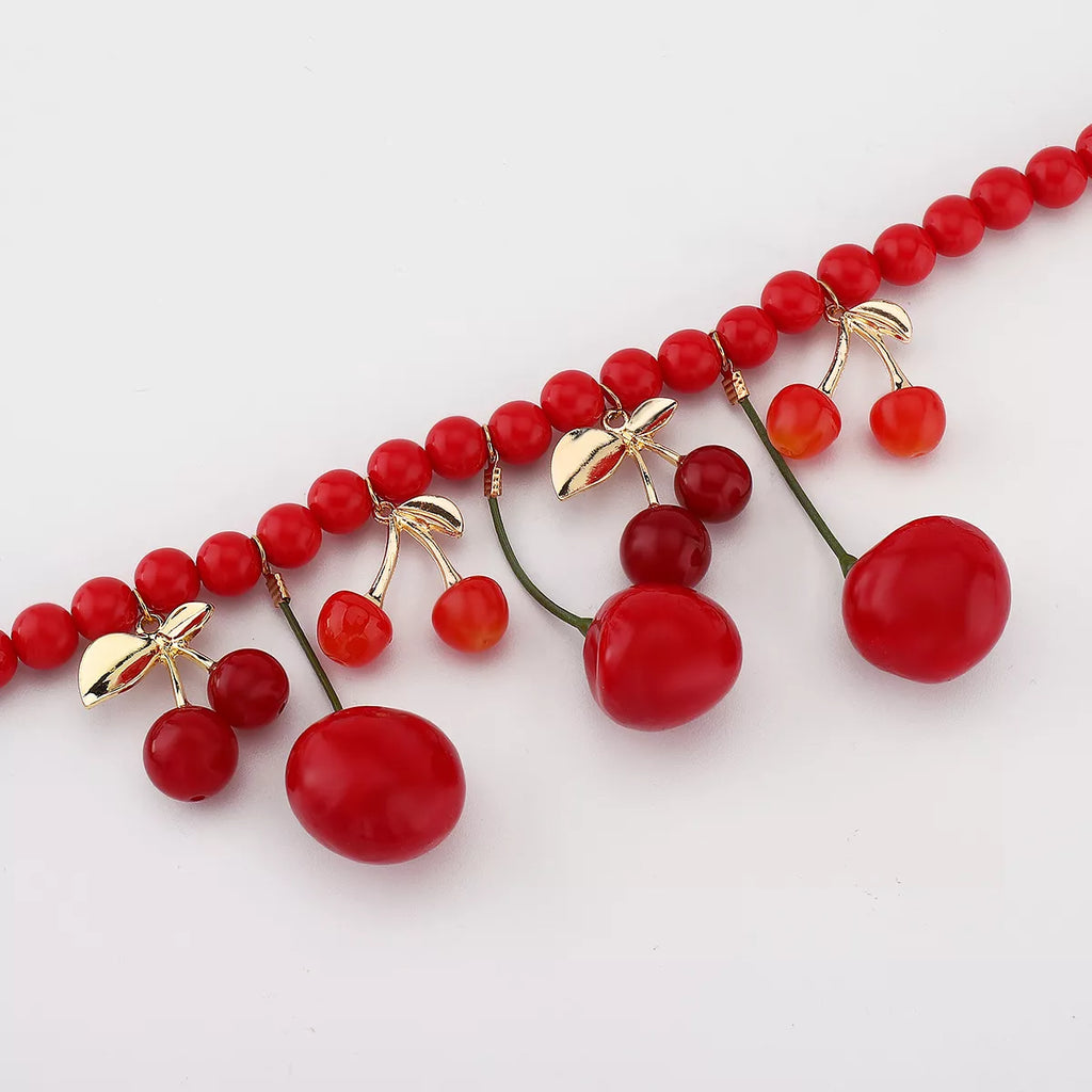 Shopimist cherry charm beaded statement necklace featuring vibrant red cherry beads and intricate beaded design.