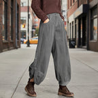 FitiqueFit corduroy wide-leg pants with lace-up detail, showcasing a stylish streetwear look with relaxed fit and textured fabric.