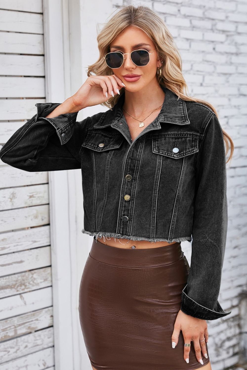 Raw hem denim jacket with pockets from Plush Fashion Hub, featuring a casual, stylish design and classic blue denim fabric.