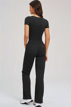 Fitglutes activewear two-piece set featuring a Sizzle T-shirt and flared leggings, perfect for gym and workout sessions.