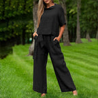 FitiqueFit activewear two-piece set with round-neck 3/4 sleeve top and matching pants in six colors.