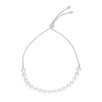 14k white gold adjustable friendship bracelet with pearls, featuring a delicate design and secure clasp, by Bids.com
