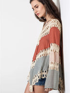 Crochet-trimmed long sleeve swim cover-up by Trendsi featuring lightweight fabric and stylish design for beachwear.