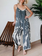 Plus size tie-dye wide-leg jumpsuit by Shopimist, full-length view showing vibrant colorful pattern and relaxed fit.