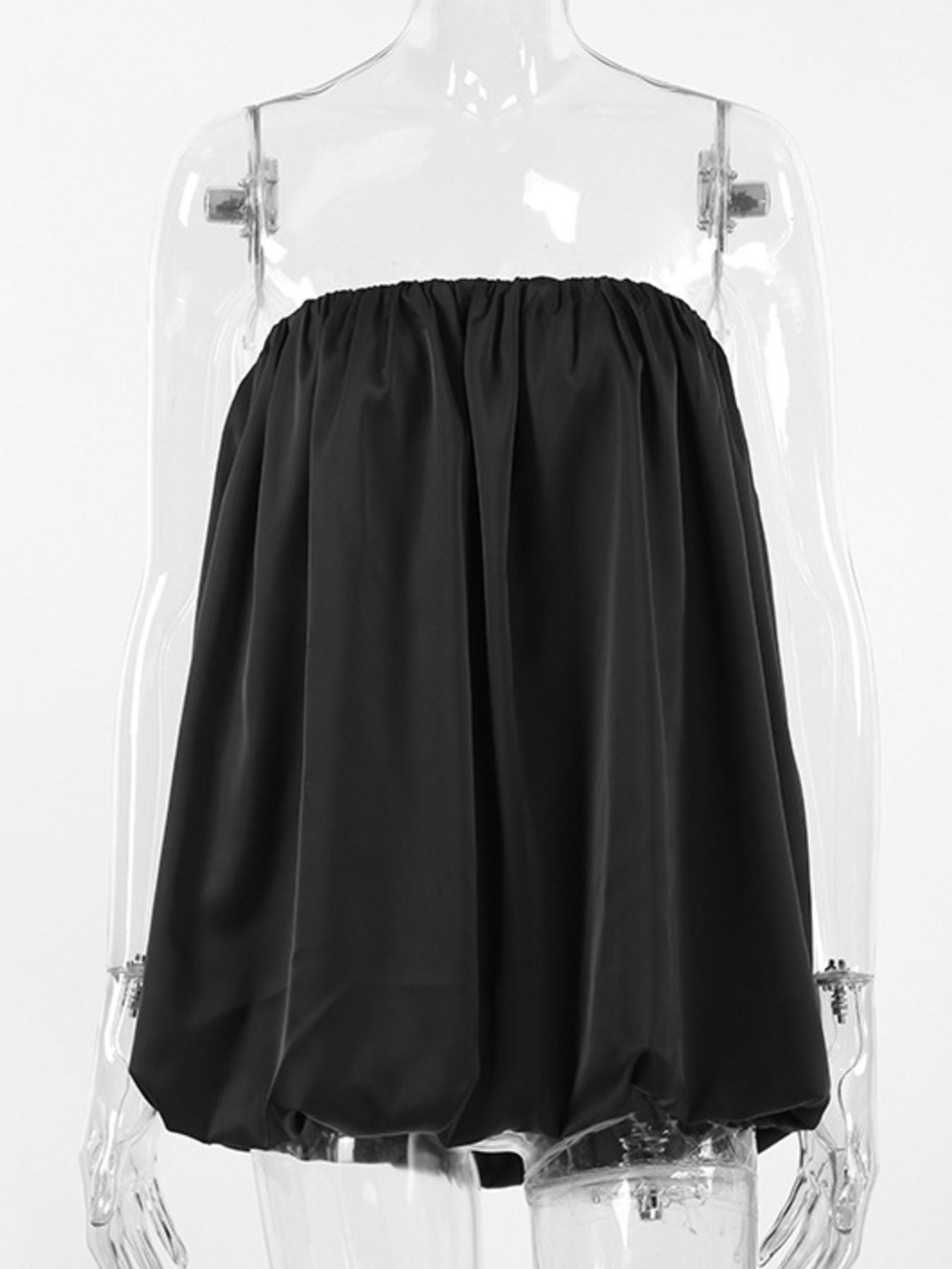 Women's strapless bubble hem tube top by Plush Fashion Hub, sleek and trendy minimalist crop top in a close-up view.