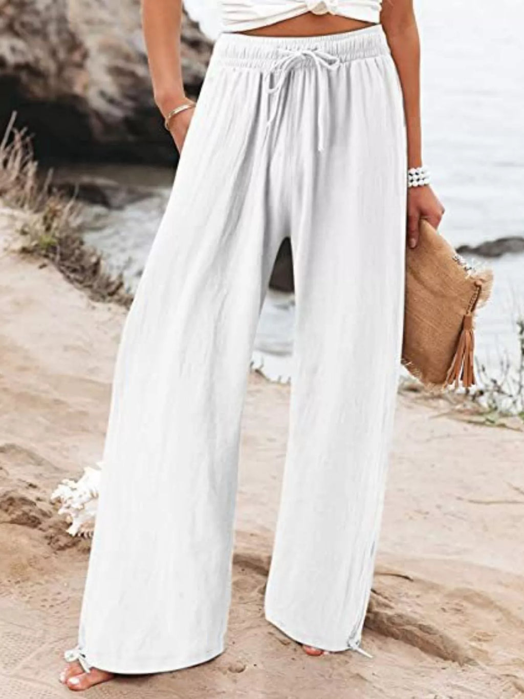 Plus size wide leg pants with drawstring waist from Shopimist, full-length, comfortable fit, casual style in neutral fabric.