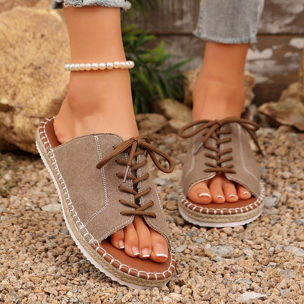 Women's lace-up open toe flat sandals in faux leather, trendy shoe by Trendsi with stylish design and comfortable fit